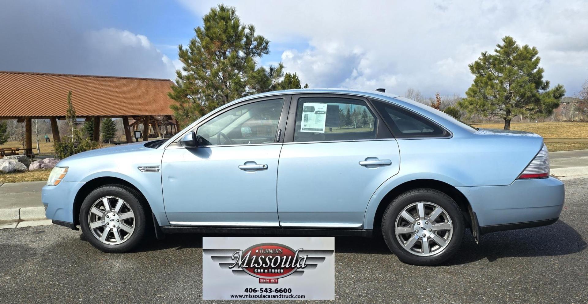 2008 Blue /Tan Ford Taurus SEL AWD (1FAHP27W98G) with an 3.5L V6 DOHC 24V engine, 6-Speed Automatic Overdrive transmission, located at 450 N Russell, Missoula, MT, 59801, (406) 543-6600, 46.874496, -114.017433 - Very Clean 2 Owner AWD Sedan. Only 78K Miles. 3.5L V6 Engine. Power Front Seats. Air. Cruise. Tilt. Power Windows and Locks. AM FM CD Player. - Photo#0