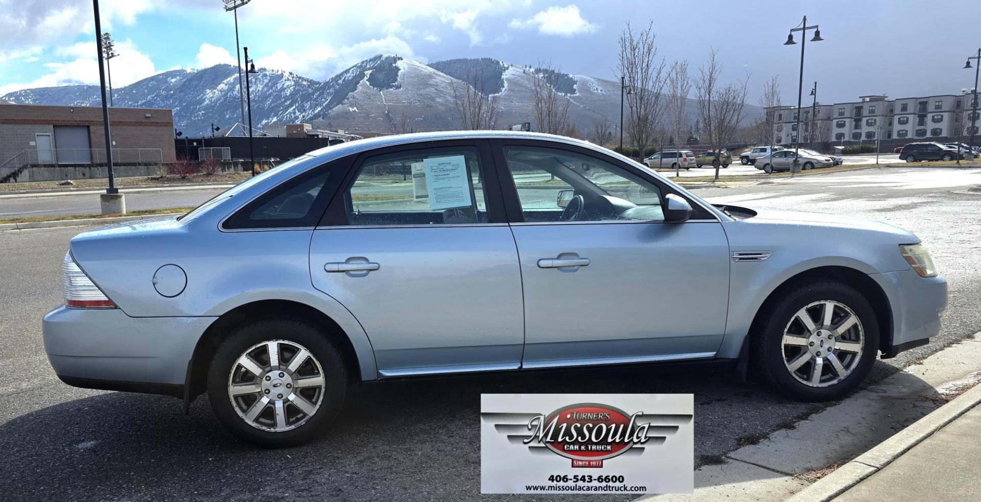 2008 Blue /Tan Ford Taurus SEL AWD (1FAHP27W98G) with an 3.5L V6 DOHC 24V engine, 6-Speed Automatic Overdrive transmission, located at 450 N Russell, Missoula, MT, 59801, (406) 543-6600, 46.874496, -114.017433 - Very Clean 2 Owner AWD Sedan. Only 78K Miles. 3.5L V6 Engine. Power Front Seats. Air. Cruise. Tilt. Power Windows and Locks. AM FM CD Player. - Photo#1