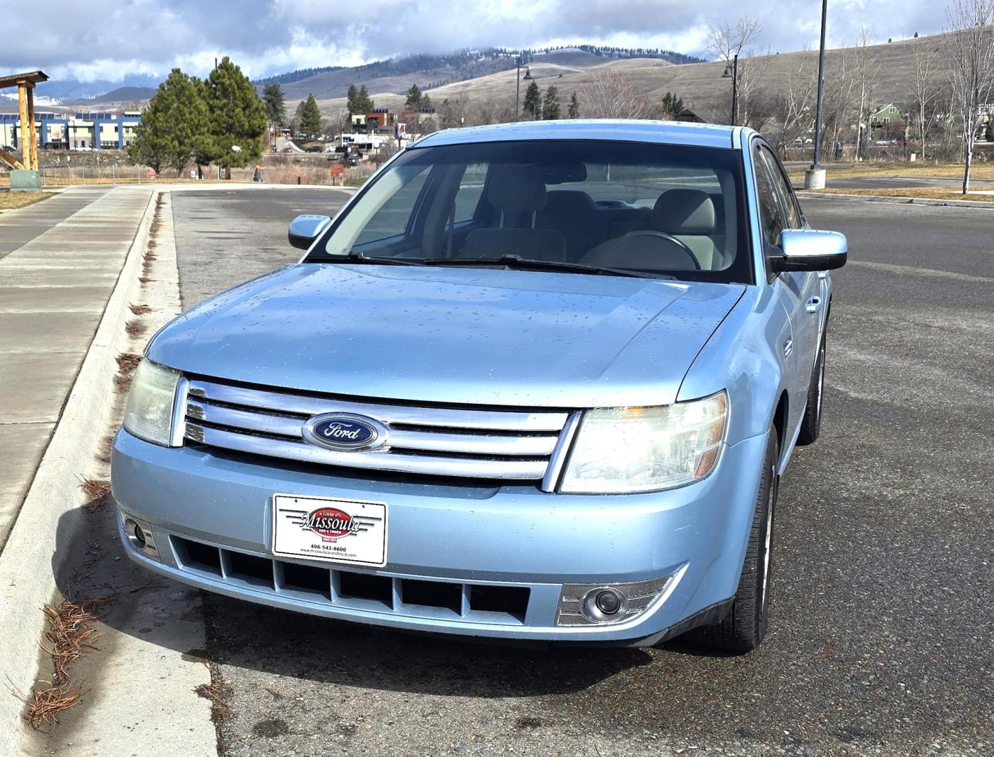 2008 Blue /Tan Ford Taurus SEL AWD (1FAHP27W98G) with an 3.5L V6 DOHC 24V engine, 6-Speed Automatic Overdrive transmission, located at 450 N Russell, Missoula, MT, 59801, (406) 543-6600, 46.874496, -114.017433 - Very Clean 2 Owner AWD Sedan. Only 78K Miles. 3.5L V6 Engine. Power Front Seats. Air. Cruise. Tilt. Power Windows and Locks. AM FM CD Player. - Photo#5