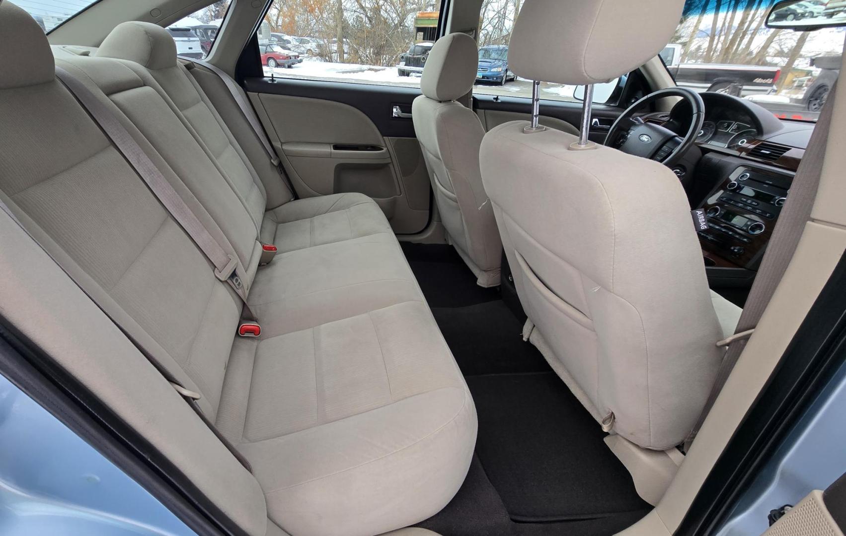 2008 Blue /Tan Ford Taurus SEL AWD (1FAHP27W98G) with an 3.5L V6 DOHC 24V engine, 6-Speed Automatic Overdrive transmission, located at 450 N Russell, Missoula, MT, 59801, (406) 543-6600, 46.874496, -114.017433 - Very Clean 2 Owner AWD Sedan. Only 78K Miles. 3.5L V6 Engine. Power Front Seats. Air. Cruise. Tilt. Power Windows and Locks. AM FM CD Player. - Photo#10