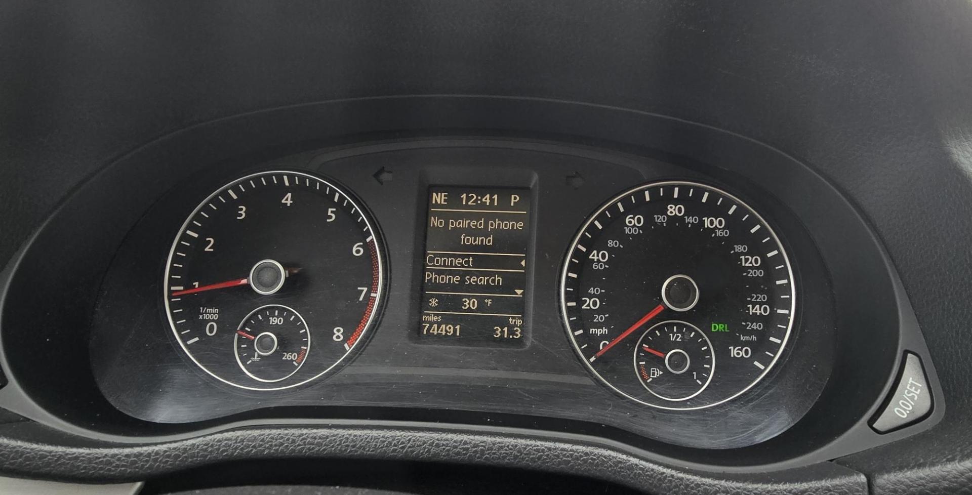 2012 White /Tan Volkswagen Passat 2.5L SE MT (1VWBH7A37CC) with an 2.5L L5 DOHC 2OV engine, Automatic transmission, located at 450 N Russell, Missoula, MT, 59801, (406) 543-6600, 46.874496, -114.017433 - Photo#12