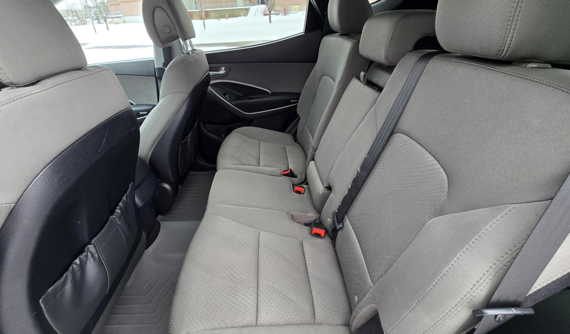 2016 Silver /Tan Hyundai Santa Fe Sport 2.4 AWD (5XYZUDLBXGG) with an 2.4L L4 DOHC 16V engine, 6-Speed Automatic transmission, located at 450 N Russell, Missoula, MT, 59801, (406) 543-6600, 46.874496, -114.017433 - Really Nice AWD SUV. One Owner. Only 89K Miles! 2.4L I4 Engine. Automatic Transmission. Air. Cruise. Tilt. New Tires. Power Drivers Seat. Heated Front Seats. Bluetooth Audio and Phone. AM FM XM CD. Backup Camera. - Photo#11