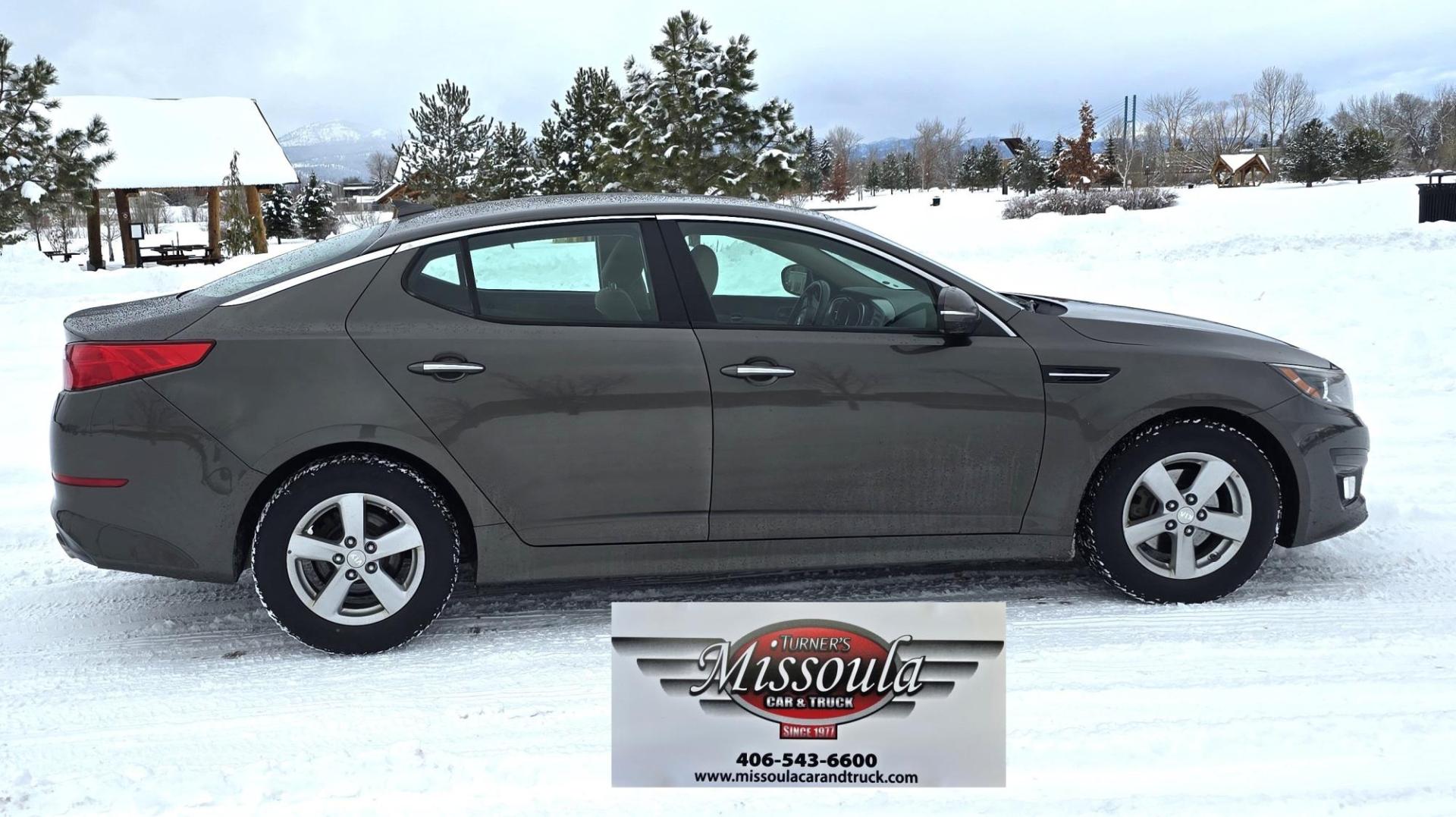 2015 Bronze /Black Kia Optima LX (5XXGM4A70FG) with an 2.4L L4 DOHC 16V engine, 6-Speed Automatic transmission, located at 450 N Russell, Missoula, MT, 59801, (406) 543-6600, 46.874496, -114.017433 - Beautiful Sedan. 2.4L I4 Engine. FWD. Automatic. Air Conditioning, Power Windows and Door Locks, AM/FM/CD/MP3 Audio System, SIRIUSXM®, USB and Auxiliary Input Jacks, Bluetooth® Wireless Technology, Front and Rear Cup Holders, Remote Keyless Entry, Cruise Control, Tilt & Telescopic Steering Column - Photo#0