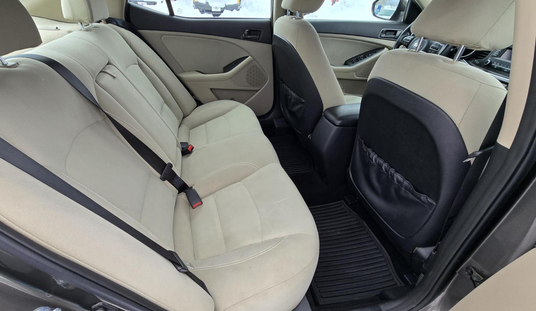 2015 Bronze /Black Kia Optima LX (5XXGM4A70FG) with an 2.4L L4 DOHC 16V engine, 6-Speed Automatic transmission, located at 450 N Russell, Missoula, MT, 59801, (406) 543-6600, 46.874496, -114.017433 - Beautiful Sedan. 2.4L I4 Engine. FWD. Automatic. Air Conditioning, Power Windows and Door Locks, AM/FM/CD/MP3 Audio System, SIRIUSXM®, USB and Auxiliary Input Jacks, Bluetooth® Wireless Technology, Front and Rear Cup Holders, Remote Keyless Entry, Cruise Control, Tilt & Telescopic Steering Column - Photo#14