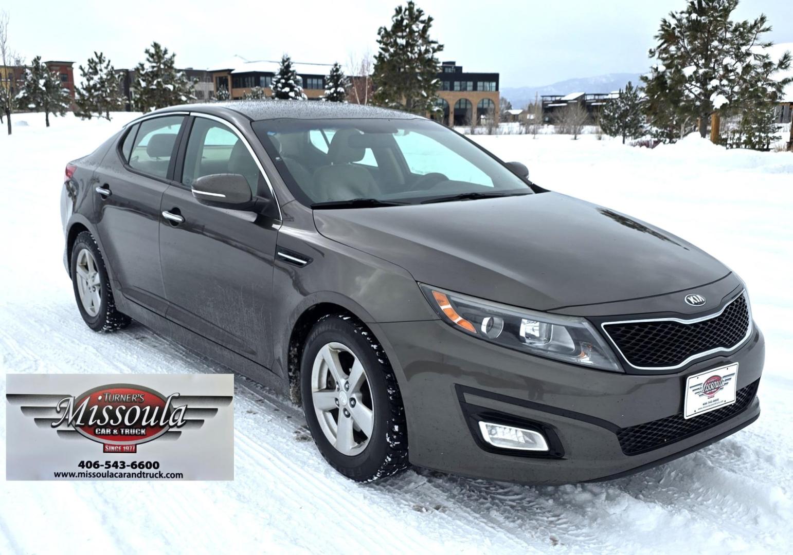 2015 Bronze /Black Kia Optima LX (5XXGM4A70FG) with an 2.4L L4 DOHC 16V engine, 6-Speed Automatic transmission, located at 450 N Russell, Missoula, MT, 59801, (406) 543-6600, 46.874496, -114.017433 - Beautiful Sedan. 2.4L I4 Engine. FWD. Automatic. Air Conditioning, Power Windows and Door Locks, AM/FM/CD/MP3 Audio System, SIRIUSXM®, USB and Auxiliary Input Jacks, Bluetooth® Wireless Technology, Front and Rear Cup Holders, Remote Keyless Entry, Cruise Control, Tilt & Telescopic Steering Column - Photo#2