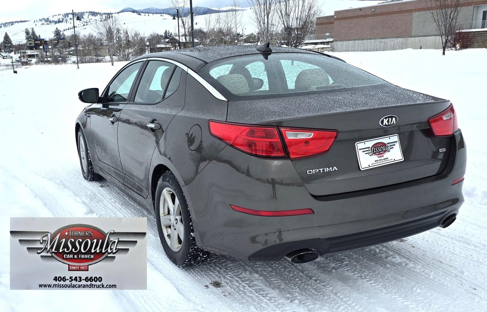 2015 Bronze /Black Kia Optima LX (5XXGM4A70FG) with an 2.4L L4 DOHC 16V engine, 6-Speed Automatic transmission, located at 450 N Russell, Missoula, MT, 59801, (406) 543-6600, 46.874496, -114.017433 - Beautiful Sedan. 2.4L I4 Engine. FWD. Automatic. Air Conditioning, Power Windows and Door Locks, AM/FM/CD/MP3 Audio System, SIRIUSXM®, USB and Auxiliary Input Jacks, Bluetooth® Wireless Technology, Front and Rear Cup Holders, Remote Keyless Entry, Cruise Control, Tilt & Telescopic Steering Column - Photo#6
