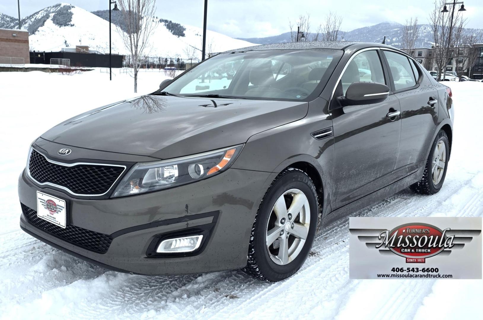 2015 Bronze /Black Kia Optima LX (5XXGM4A70FG) with an 2.4L L4 DOHC 16V engine, 6-Speed Automatic transmission, located at 450 N Russell, Missoula, MT, 59801, (406) 543-6600, 46.874496, -114.017433 - Beautiful Sedan. 2.4L I4 Engine. FWD. Automatic. Air Conditioning, Power Windows and Door Locks, AM/FM/CD/MP3 Audio System, SIRIUSXM®, USB and Auxiliary Input Jacks, Bluetooth® Wireless Technology, Front and Rear Cup Holders, Remote Keyless Entry, Cruise Control, Tilt & Telescopic Steering Column - Photo#5