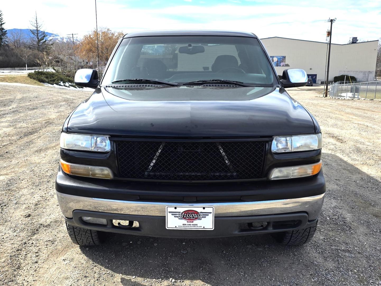 1999 Black /Black Chevrolet Silverado 1500 Ext. Cab Long Bed 4WD (2GCEK19T7X1) with an 5.3L V8 OHV 16V engine, located at 450 N Russell, Missoula, MT, 59801, (406) 543-6600, 46.874496, -114.017433 - Beautiful Chevy 4WD. 5.3L V8 Engine. Automatic Transmission. Previous Owner had it repainted a few years ago. It's not perfect but still really nice. Runs Amazing. Has Two Deep Cycle Marine Batteries and Two Alternators.. Air. Cruise. Tilt. Power Windows and Locks. Aftermarket Wheels and Pirelli Sco - Photo#6