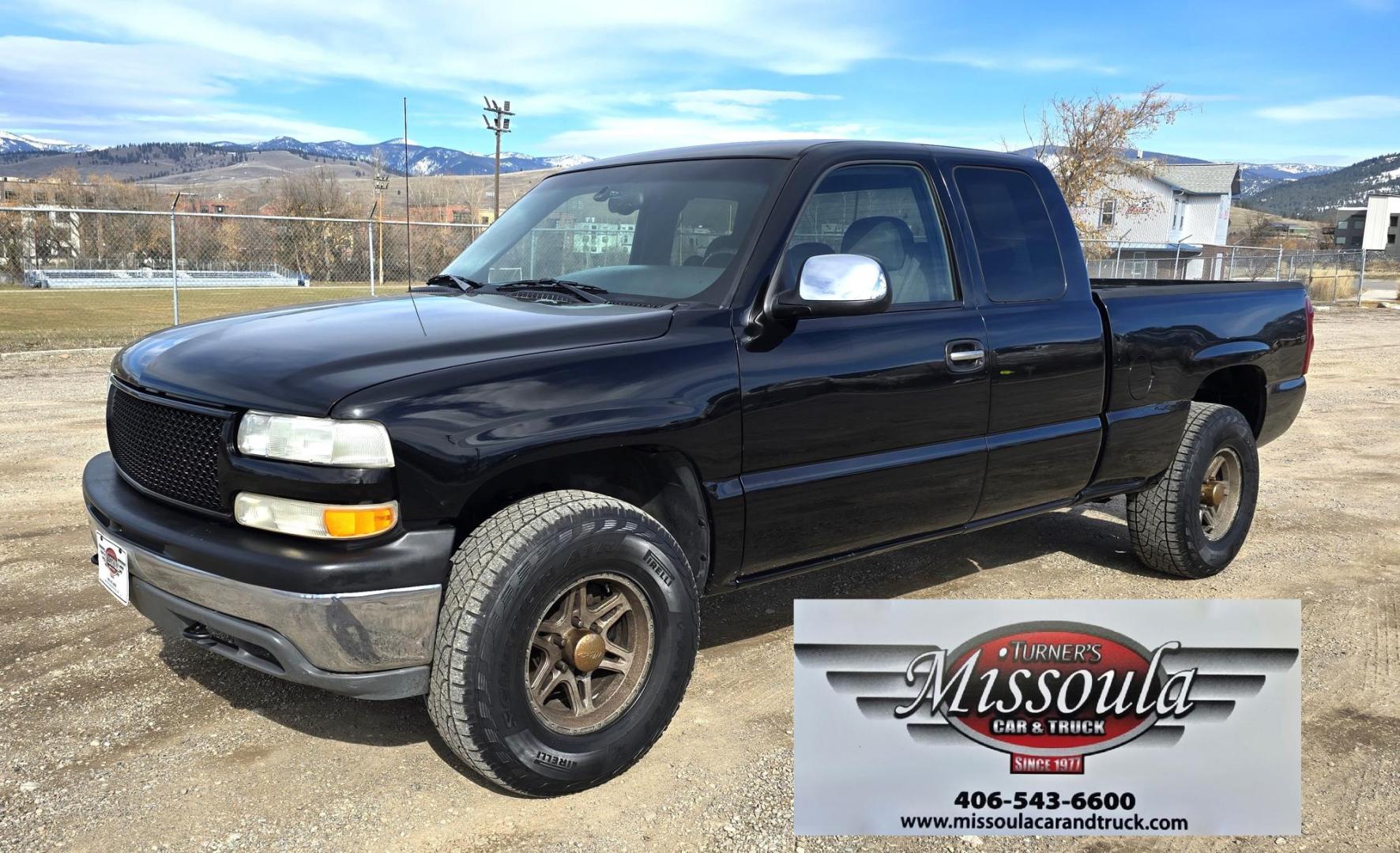 1999 Black /Black Chevrolet Silverado 1500 Ext. Cab Long Bed 4WD (2GCEK19T7X1) with an 5.3L V8 OHV 16V engine, located at 450 N Russell, Missoula, MT, 59801, (406) 543-6600, 46.874496, -114.017433 - Beautiful Chevy 4WD. 5.3L V8 Engine. Automatic Transmission. Previous Owner had it repainted a few years ago. It's not perfect but still really nice. Runs Amazing. Has Two Deep Cycle Marine Batteries and Two Alternators.. Air. Cruise. Tilt. Power Windows and Locks. Aftermarket Wheels and Pirelli Sco - Photo#7