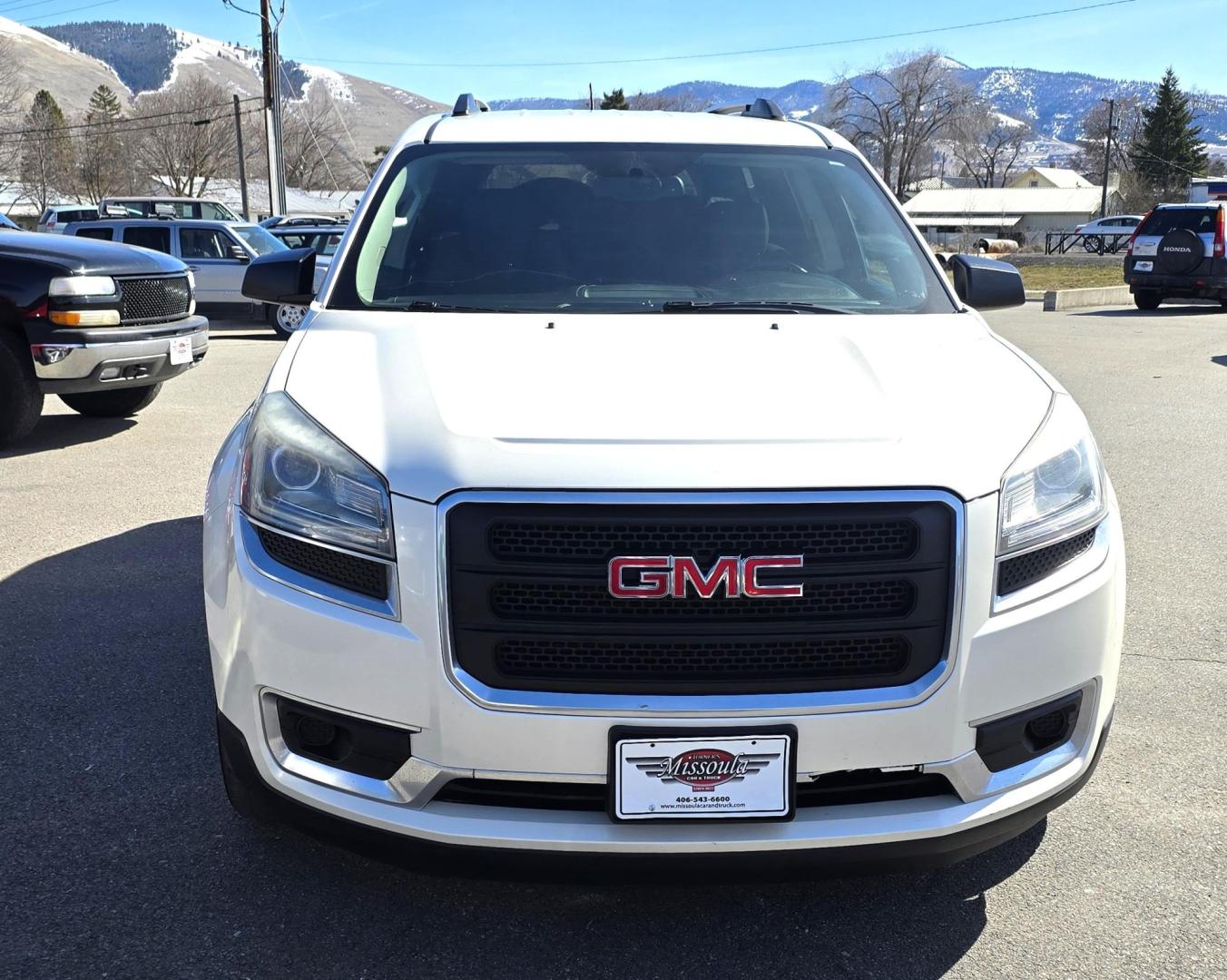 2013 White /Black GMC Acadia SLE-2 AWD (1GKKVPED2DJ) with an 3.6L V6 DOHC 24V engine, 6A transmission, located at 450 N Russell, Missoula, MT, 59801, (406) 543-6600, 46.874496, -114.017433 - Sharp AWD SUV. 3rd Row Seating. 3.6L V6. Automatic. Air. Cruise. Tilt. 2nd Row Captains Seats. Heated Front Seats. Power Lift Gate. Bluetooth Audio and Phone. Remote Start. Towing. - Photo#5