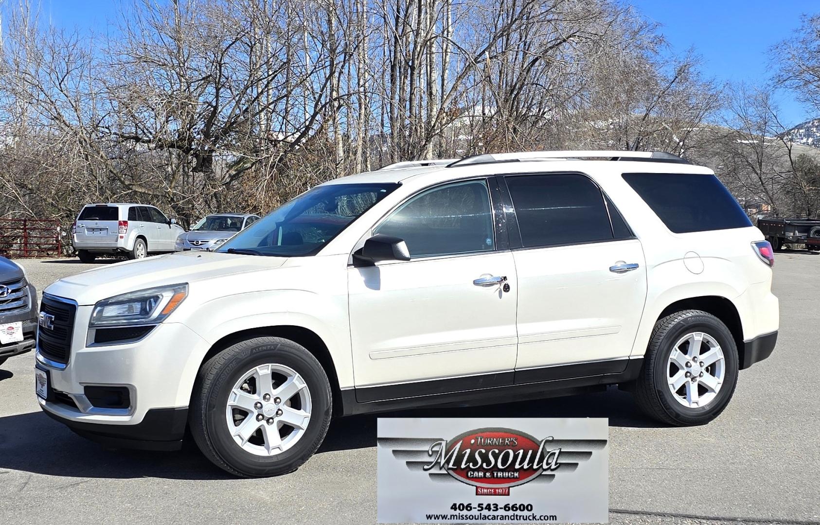 2013 White /Black GMC Acadia SLE-2 AWD (1GKKVPED2DJ) with an 3.6L V6 DOHC 24V engine, 6A transmission, located at 450 N Russell, Missoula, MT, 59801, (406) 543-6600, 46.874496, -114.017433 - Sharp AWD SUV. 3rd Row Seating. 3.6L V6. Automatic. Air. Cruise. Tilt. 2nd Row Captains Seats. Heated Front Seats. Power Lift Gate. Bluetooth Audio and Phone. Remote Start. Towing. - Photo#0