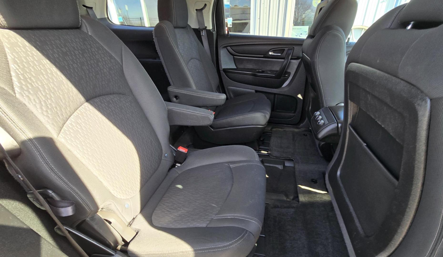 2013 White /Black GMC Acadia SLE-2 AWD (1GKKVPED2DJ) with an 3.6L V6 DOHC 24V engine, 6A transmission, located at 450 N Russell, Missoula, MT, 59801, (406) 543-6600, 46.874496, -114.017433 - Sharp AWD SUV. 3rd Row Seating. 3.6L V6. Automatic. Air. Cruise. Tilt. 2nd Row Captains Seats. Heated Front Seats. Power Lift Gate. Bluetooth Audio and Phone. Remote Start. Towing. - Photo#10