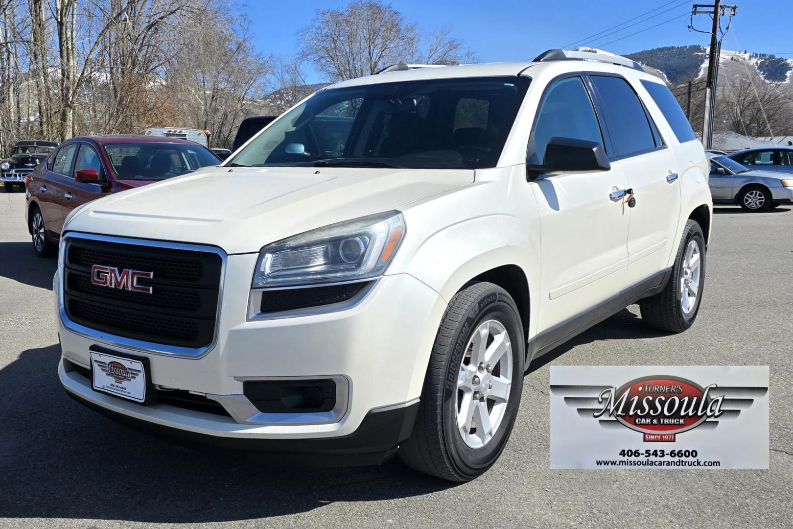 2013 White /Black GMC Acadia SLE-2 AWD (1GKKVPED2DJ) with an 3.6L V6 DOHC 24V engine, 6A transmission, located at 450 N Russell, Missoula, MT, 59801, (406) 543-6600, 46.874496, -114.017433 - Sharp AWD SUV. 3rd Row Seating. 3.6L V6. Automatic. Air. Cruise. Tilt. 2nd Row Captains Seats. Heated Front Seats. Power Lift Gate. Bluetooth Audio and Phone. Remote Start. Towing. - Photo#3