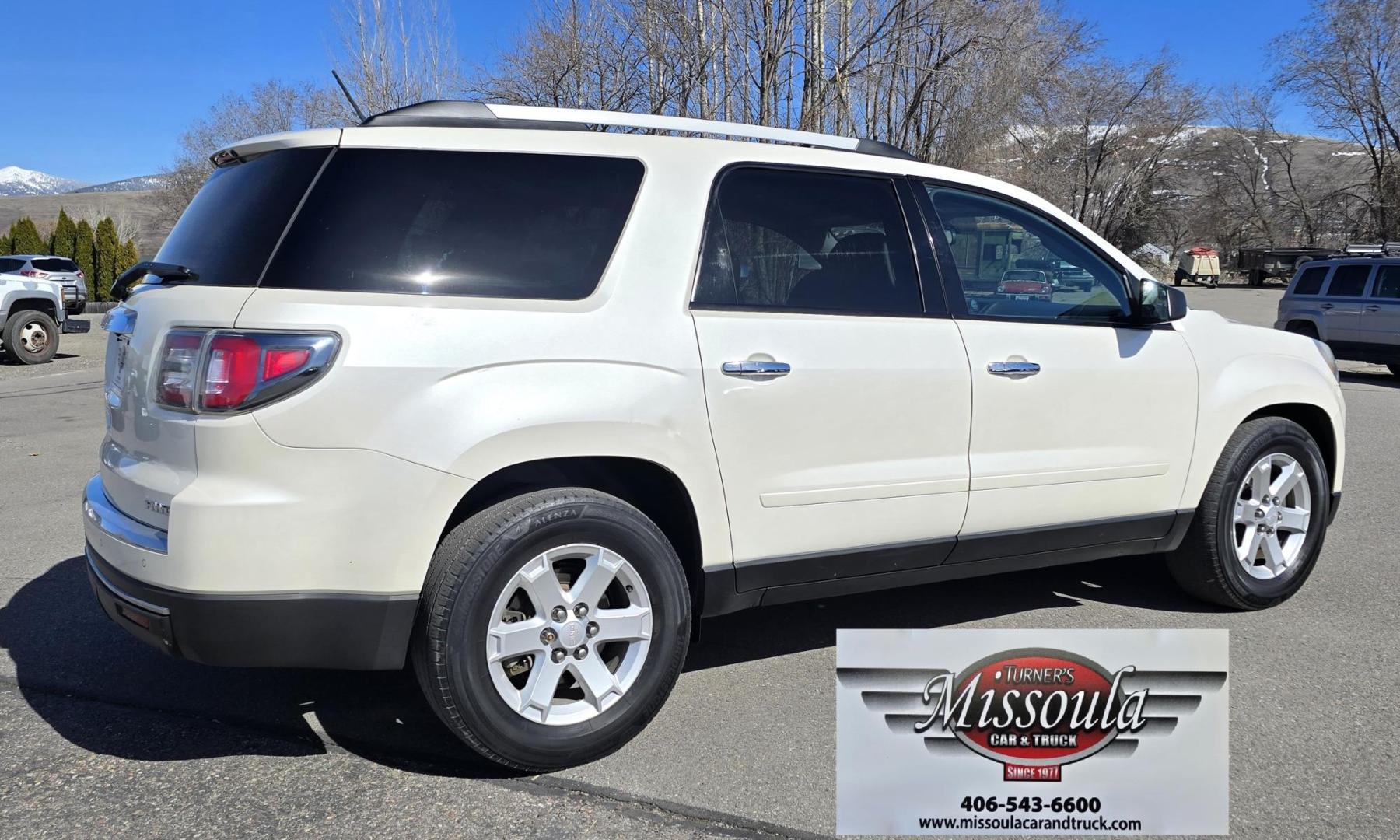 2013 White /Black GMC Acadia SLE-2 AWD (1GKKVPED2DJ) with an 3.6L V6 DOHC 24V engine, 6A transmission, located at 450 N Russell, Missoula, MT, 59801, (406) 543-6600, 46.874496, -114.017433 - Sharp AWD SUV. 3rd Row Seating. 3.6L V6. Automatic. Air. Cruise. Tilt. 2nd Row Captains Seats. Heated Front Seats. Power Lift Gate. Bluetooth Audio and Phone. Remote Start. Towing. - Photo#2
