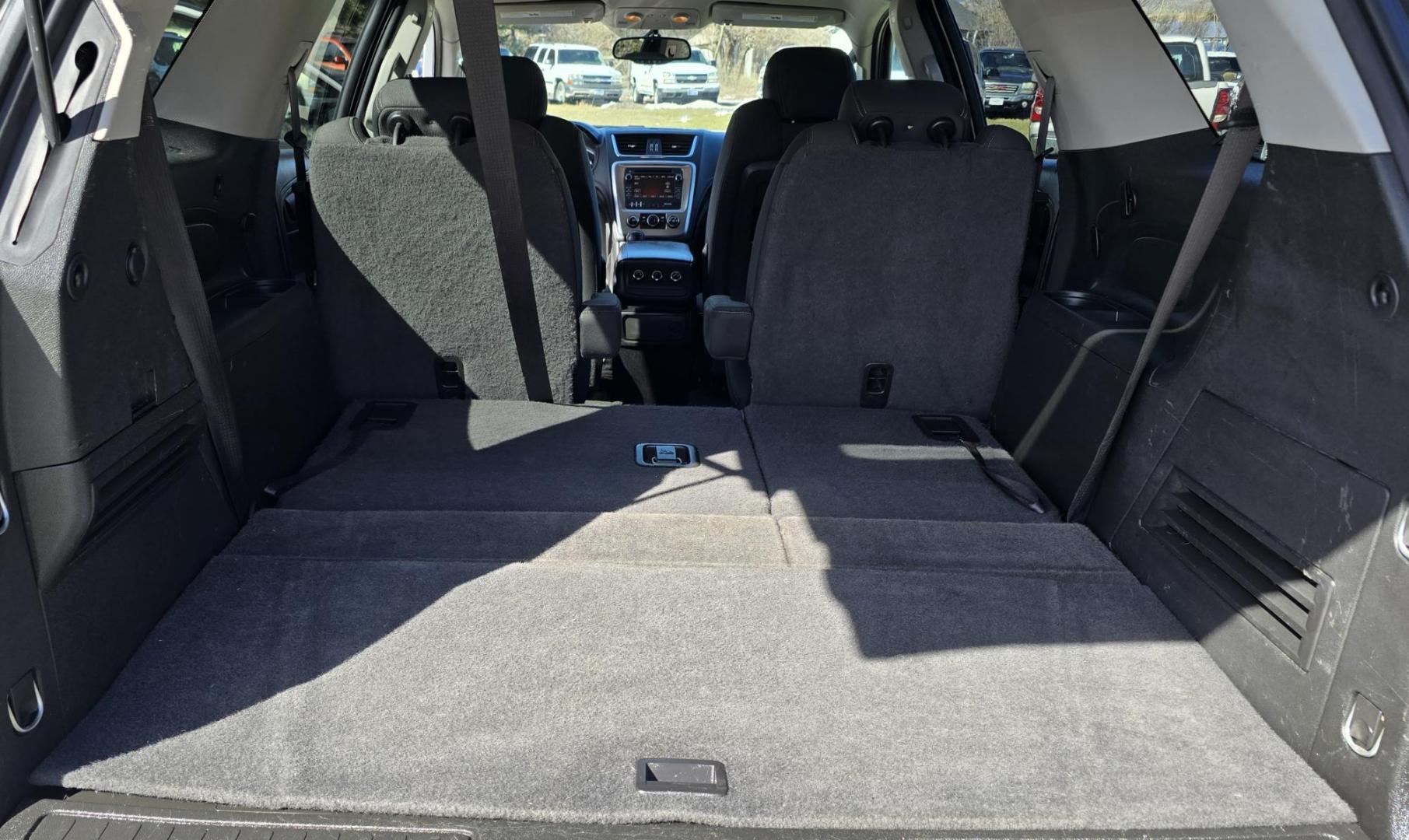 2013 White /Black GMC Acadia SLE-2 AWD (1GKKVPED2DJ) with an 3.6L V6 DOHC 24V engine, 6A transmission, located at 450 N Russell, Missoula, MT, 59801, (406) 543-6600, 46.874496, -114.017433 - Sharp AWD SUV. 3rd Row Seating. 3.6L V6. Automatic. Air. Cruise. Tilt. 2nd Row Captains Seats. Heated Front Seats. Power Lift Gate. Bluetooth Audio and Phone. Remote Start. Towing. - Photo#7