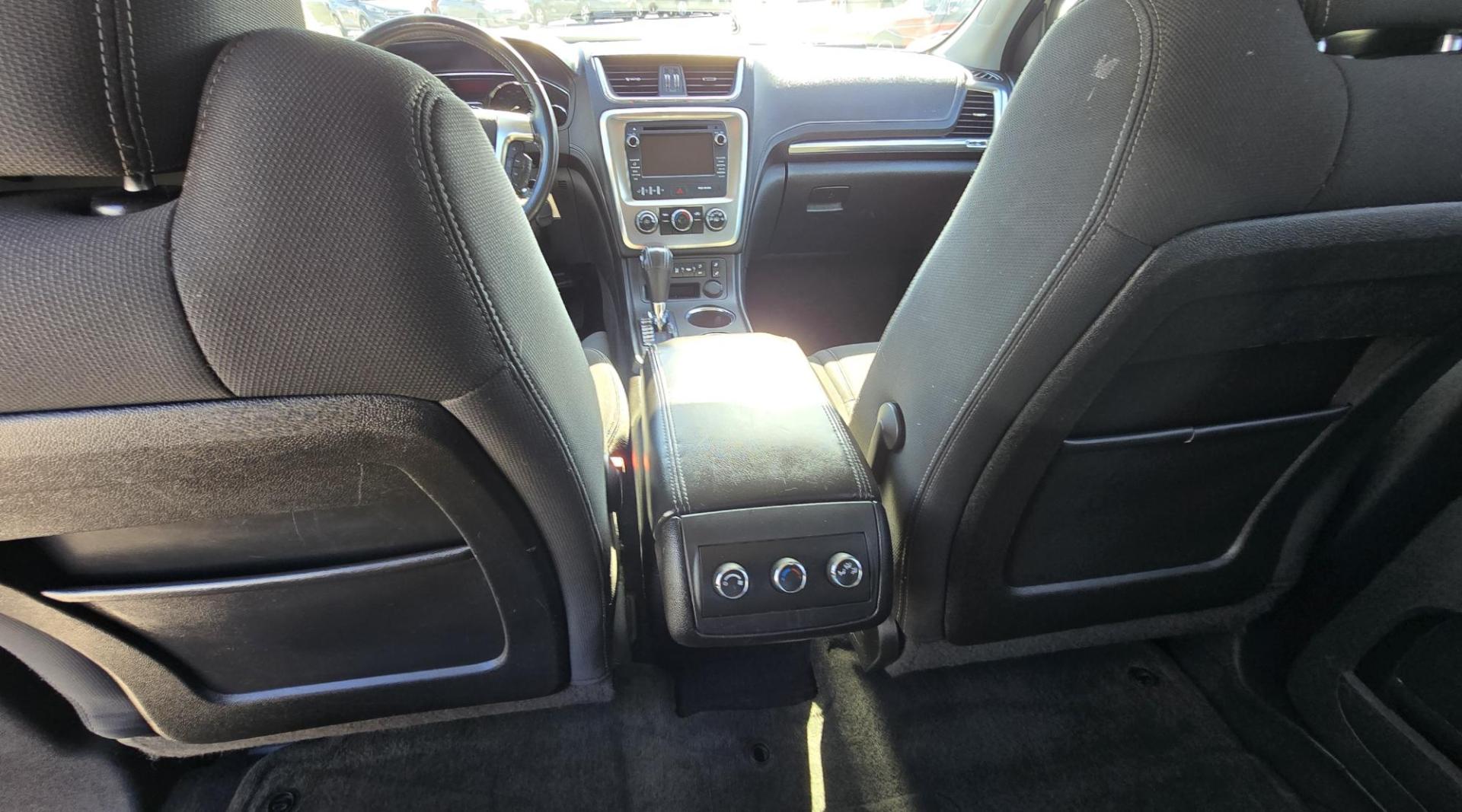 2013 White /Black GMC Acadia SLE-2 AWD (1GKKVPED2DJ) with an 3.6L V6 DOHC 24V engine, 6A transmission, located at 450 N Russell, Missoula, MT, 59801, (406) 543-6600, 46.874496, -114.017433 - Sharp AWD SUV. 3rd Row Seating. 3.6L V6. Automatic. Air. Cruise. Tilt. 2nd Row Captains Seats. Heated Front Seats. Power Lift Gate. Bluetooth Audio and Phone. Remote Start. Towing. - Photo#9