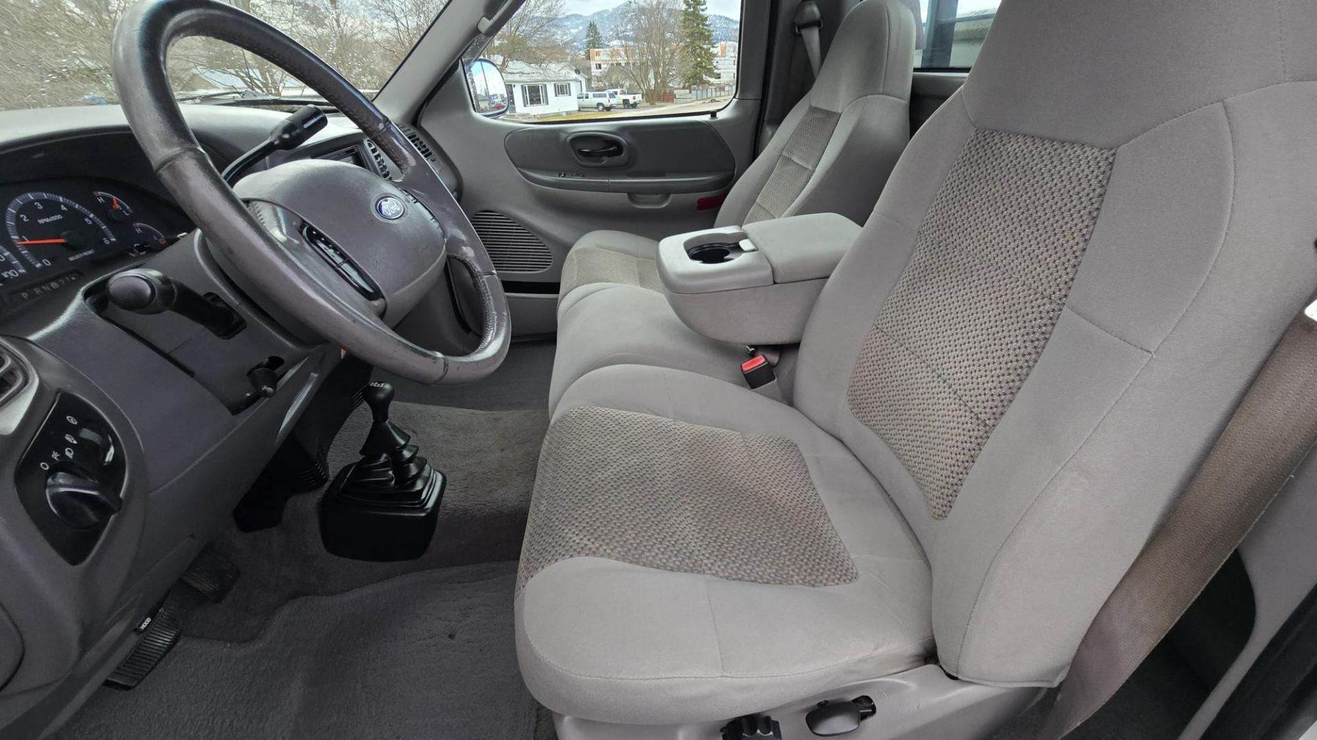 2003 White /Black Ford F-150 XL 4WD (2FTRF18L73C) with an 5.4L V8 SOHC 16V engine, Automatic transmission, located at 450 N Russell, Missoula, MT, 59801, (406) 543-6600, 46.874496, -114.017433 - Single Cab Long Box. 5.4L V8. Automatic Transmission. 4WD. Lot's of miles but runs great. Power Drivers Seat. Air. Cruise. Power Windows and Locks. Aftermarket Bluetooth. Nice tool box. New Tires. Because of the age, financing through our lenders is not available. - Photo#11