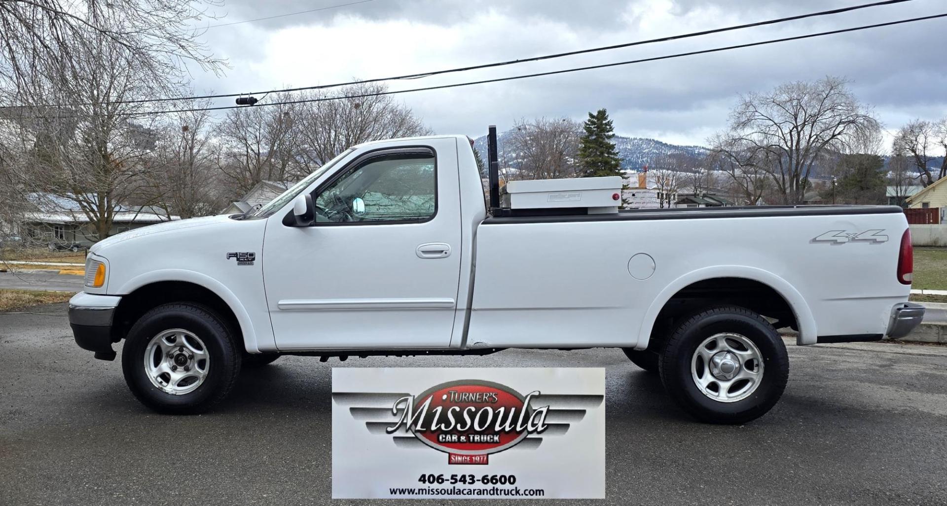 2003 White /Black Ford F-150 XL 4WD (2FTRF18L73C) with an 5.4L V8 SOHC 16V engine, Automatic transmission, located at 450 N Russell, Missoula, MT, 59801, (406) 543-6600, 46.874496, -114.017433 - Single Cab Long Box. 5.4L V8. Automatic Transmission. 4WD. Lot's of miles but runs great. Power Drivers Seat. Air. Cruise. Power Windows and Locks. Aftermarket Bluetooth. Nice tool box. New Tires. Because of the age, financing through our lenders is not available. - Photo#2