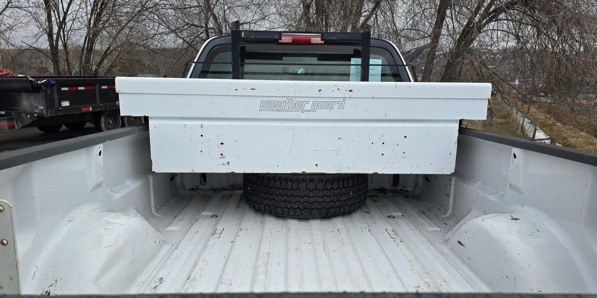 2003 White /Black Ford F-150 XL 4WD (2FTRF18L73C) with an 5.4L V8 SOHC 16V engine, Automatic transmission, located at 450 N Russell, Missoula, MT, 59801, (406) 543-6600, 46.874496, -114.017433 - Single Cab Long Box. 5.4L V8. Automatic Transmission. 4WD. Lot's of miles but runs great. Power Drivers Seat. Air. Cruise. Power Windows and Locks. Aftermarket Bluetooth. Nice tool box. New Tires. Because of the age, financing through our lenders is not available. - Photo#8