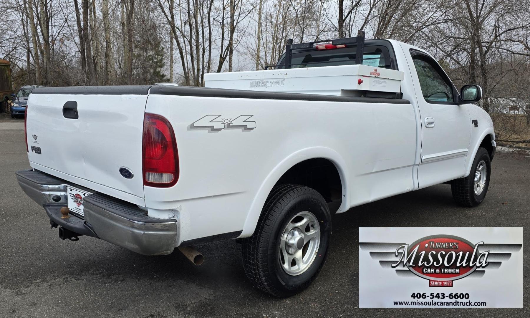 2003 White /Black Ford F-150 XL 4WD (2FTRF18L73C) with an 5.4L V8 SOHC 16V engine, Automatic transmission, located at 450 N Russell, Missoula, MT, 59801, (406) 543-6600, 46.874496, -114.017433 - Single Cab Long Box. 5.4L V8. Automatic Transmission. 4WD. Lot's of miles but runs great. Power Drivers Seat. Air. Cruise. Power Windows and Locks. Aftermarket Bluetooth. Nice tool box. New Tires. Because of the age, financing through our lenders is not available. - Photo#9
