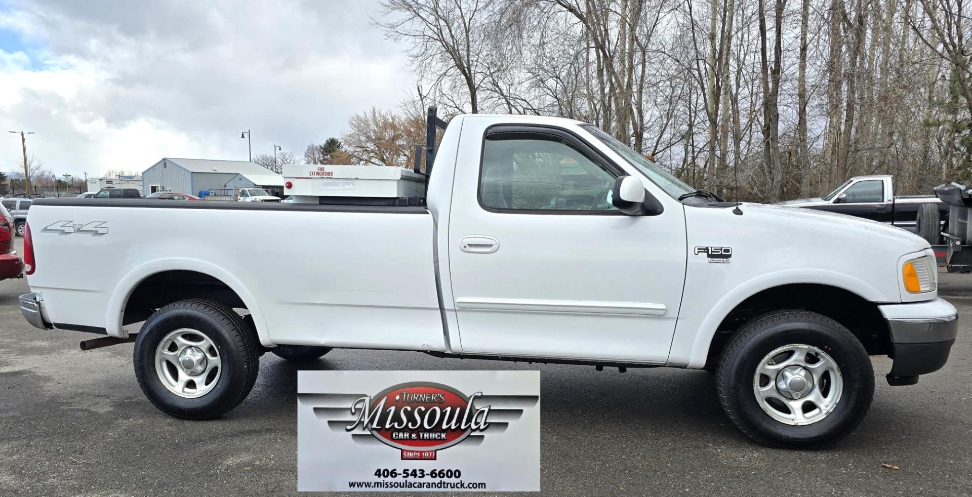 2003 White /Black Ford F-150 XL 4WD (2FTRF18L73C) with an 5.4L V8 SOHC 16V engine, Automatic transmission, located at 450 N Russell, Missoula, MT, 59801, (406) 543-6600, 46.874496, -114.017433 - Single Cab Long Box. 5.4L V8. Automatic Transmission. 4WD. Lot's of miles but runs great. Power Drivers Seat. Air. Cruise. Power Windows and Locks. Aftermarket Bluetooth. Nice tool box. New Tires. Because of the age, financing through our lenders is not available. - Photo#1