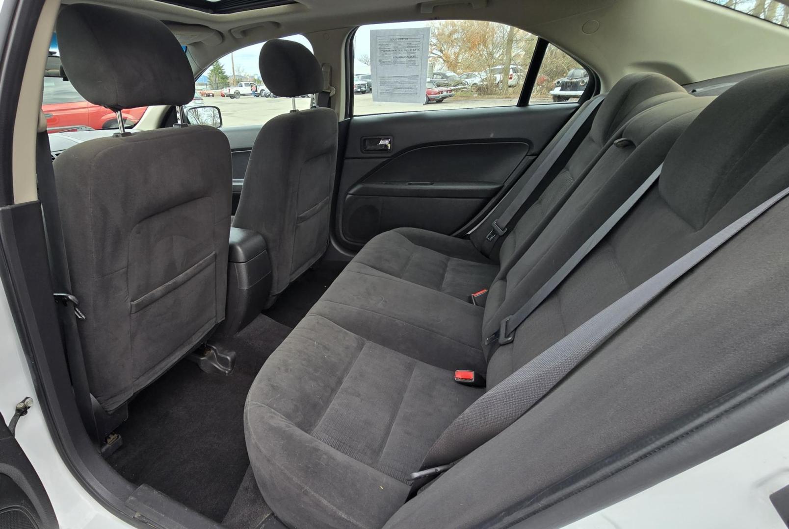 2006 White /Black Ford Fusion V6 SE (3FAFP07146R) with an 3.0L V6 DOHC 24V engine, 6-Speed Automatic Overdrive transmission, located at 450 N Russell, Missoula, MT, 59801, (406) 543-6600, 46.874496, -114.017433 - Clean FWD Sedan with only 103K Miles. 3.0L V6 has lots of pep. Power Sunroof. AM FM CD and Bluetooth. Air. Cruise. Tilt. Power Windows and Locks. - Photo#10