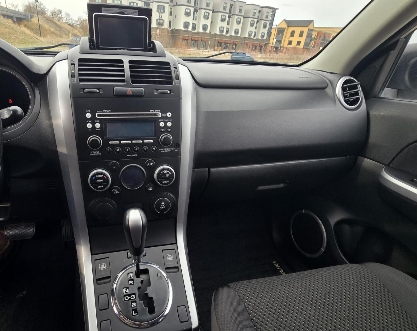 2012 Silver /Black Suzuki Grand Vitara Premium 4WD (JS3TD0D6XC4) with an 2.4L L4 DOHC 16V engine, 4-Speed Automatic transmission, located at 450 N Russell, Missoula, MT, 59801, (406) 543-6600, 46.874496, -114.017433 - Clean Little One Owner AWD SUV. 2.4L I4 Engine. Automatic Transmission. Air Cruise Tilt. Power Windows and Locks. Like New BF Goodrich Tires. - Photo#13