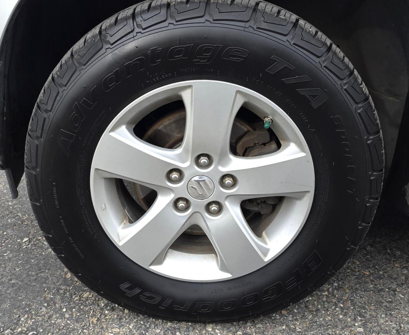 2012 Silver /Black Suzuki Grand Vitara Premium 4WD (JS3TD0D6XC4) with an 2.4L L4 DOHC 16V engine, 4-Speed Automatic transmission, located at 450 N Russell, Missoula, MT, 59801, (406) 543-6600, 46.874496, -114.017433 - Clean Little One Owner AWD SUV. 2.4L I4 Engine. Automatic Transmission. Air Cruise Tilt. Power Windows and Locks. Like New BF Goodrich Tires. - Photo#14