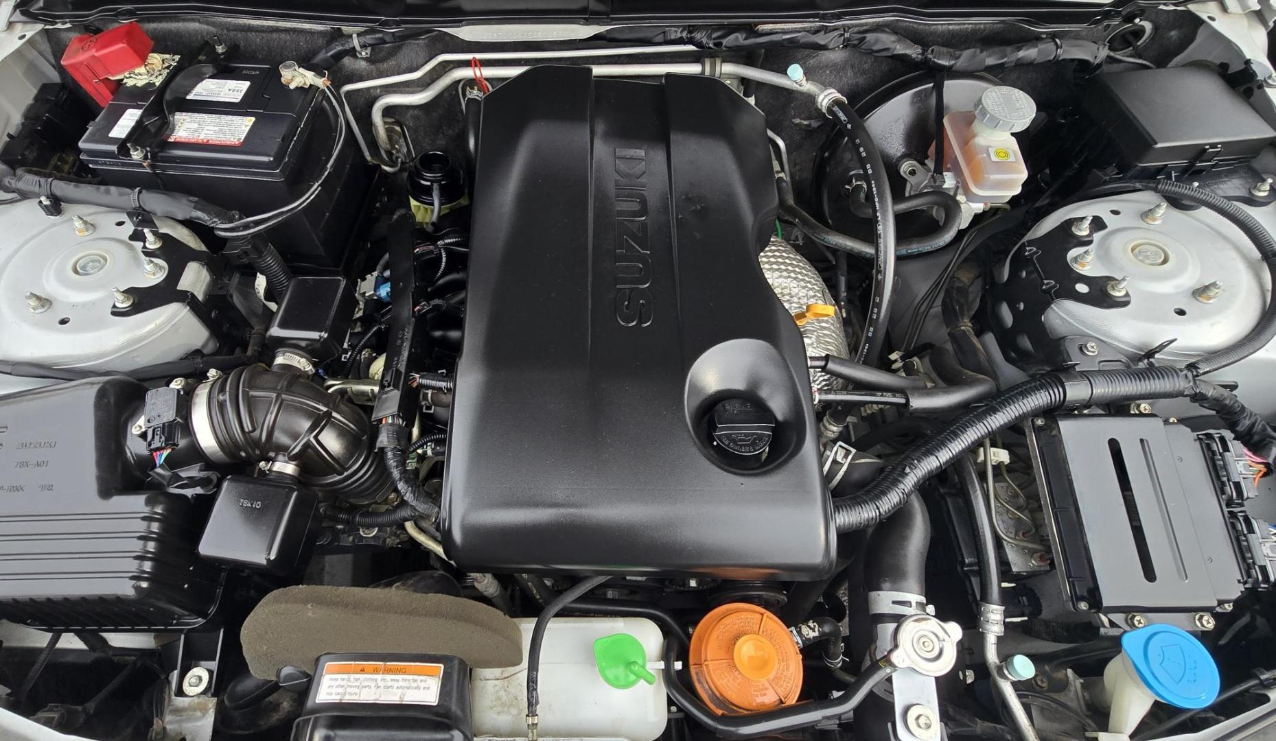 2012 Silver /Black Suzuki Grand Vitara Premium 4WD (JS3TD0D6XC4) with an 2.4L L4 DOHC 16V engine, 4-Speed Automatic transmission, located at 450 N Russell, Missoula, MT, 59801, (406) 543-6600, 46.874496, -114.017433 - Clean Little One Owner AWD SUV. 2.4L I4 Engine. Automatic Transmission. Air Cruise Tilt. Power Windows and Locks. Like New BF Goodrich Tires. - Photo#15