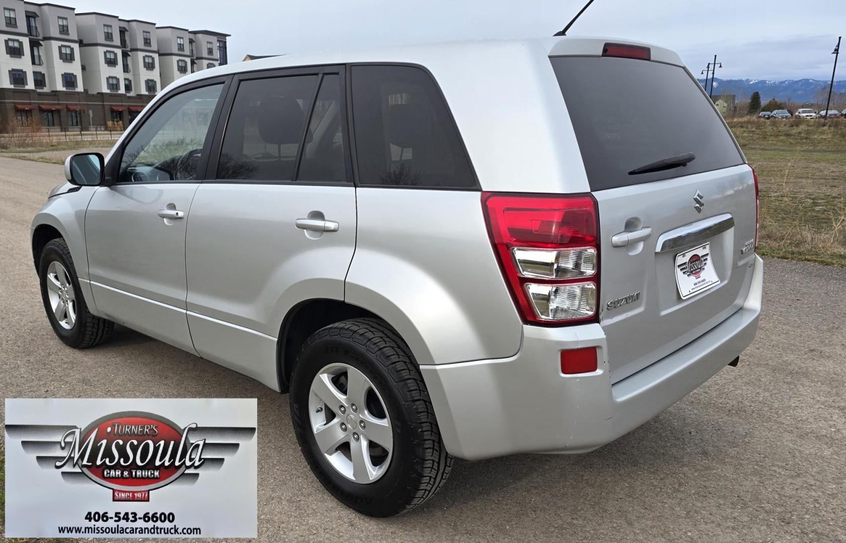 2012 Silver /Black Suzuki Grand Vitara Premium 4WD (JS3TD0D6XC4) with an 2.4L L4 DOHC 16V engine, 4-Speed Automatic transmission, located at 450 N Russell, Missoula, MT, 59801, (406) 543-6600, 46.874496, -114.017433 - Clean Little One Owner AWD SUV. 2.4L I4 Engine. Automatic Transmission. Air Cruise Tilt. Power Windows and Locks. Like New BF Goodrich Tires. - Photo#5
