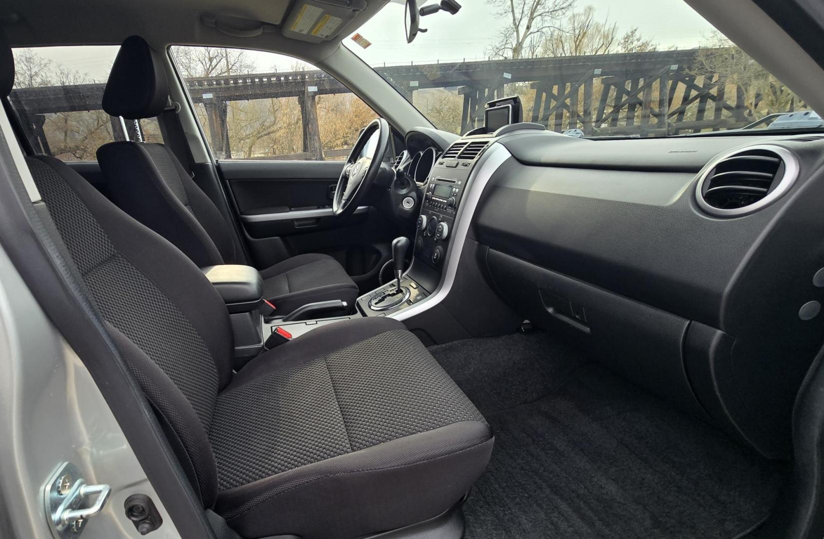 2012 Silver /Black Suzuki Grand Vitara Premium 4WD (JS3TD0D6XC4) with an 2.4L L4 DOHC 16V engine, 4-Speed Automatic transmission, located at 450 N Russell, Missoula, MT, 59801, (406) 543-6600, 46.874496, -114.017433 - Clean Little One Owner AWD SUV. 2.4L I4 Engine. Automatic Transmission. Air Cruise Tilt. Power Windows and Locks. Like New BF Goodrich Tires. - Photo#7