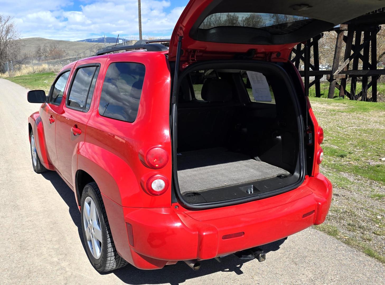 2011 Red /Black Chevrolet HHR 1LT (3GNBABFW1BS) with an 2.2L L4 DOHC 16V FFV engine, 4-Speed Automatic transmission, located at 450 N Russell, Missoula, MT, 59801, (406) 543-6600, 46.874496, -114.017433 - Beautiful HHR that Runs Amazing. FWD. 2.2L I4 Engine. Automatic Transmission. Air. Cruise. Tilt. Power Windows and Locks. Power Drivers Seat. Even has a hitch on the back fro light towing. Because of a mileage discrepancy the Title has been Branded (Not Salvage) so financing is not available fro - Photo#6