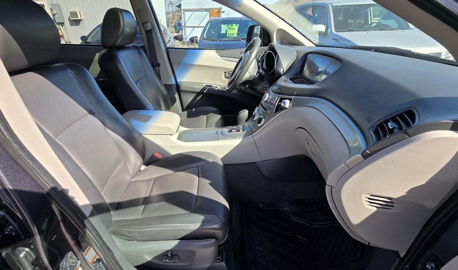 2008 Grey /Black Subaru Tribeca Limited 7-Passenger (4S4WX97D884) with an 3.6L H6 DOHC 24V engine, 5-Speed Automatic Overdrive transmission, located at 450 N Russell, Missoula, MT, 59801, (406) 543-6600, 46.874496, -114.017433 - Hard To find 6 cylinder Subaru Tribeca. Timing Chain not a Timing Belt. All Wheel Drive. Automatic Transmission. 3rd Row Seating. Power Sunroof. New Brakes, Rotors and Calipers all the way around. Heated Leather Front Seats. Power Windows and Locks. Air. Cruise. Tilt. Towing - Photo#14