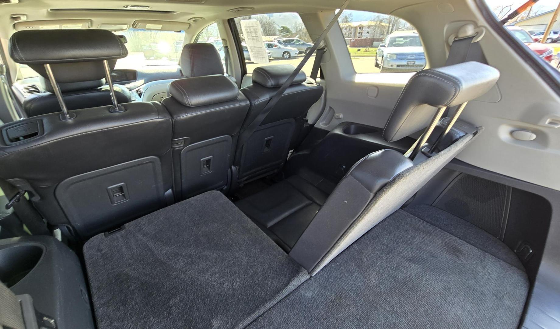 2008 Grey /Black Subaru Tribeca Limited 7-Passenger (4S4WX97D884) with an 3.6L H6 DOHC 24V engine, 5-Speed Automatic Overdrive transmission, located at 450 N Russell, Missoula, MT, 59801, (406) 543-6600, 46.874496, -114.017433 - Hard To find 6 cylinder Subaru Tribeca. Timing Chain not a Timing Belt. All Wheel Drive. Automatic Transmission. 3rd Row Seating. Power Sunroof. New Brakes, Rotors and Calipers all the way around. Heated Leather Front Seats. Power Windows and Locks. Air. Cruise. Tilt. Towing - Photo#13