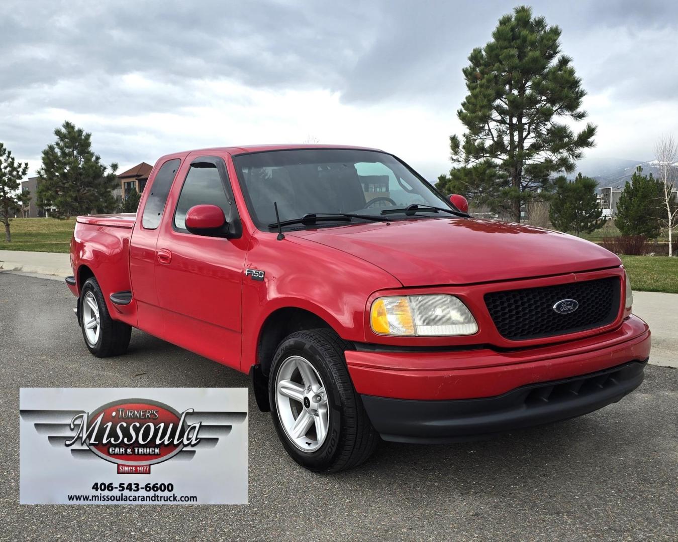 2000 Red /Black Ford F-150 XL SuperCab Flareside 2WD (1FTZX0721YK) with an 4.2L V6 OHV 12V engine, Automatic transmission, located at 450 N Russell, Missoula, MT, 59801, (406) 543-6600, 46.874496, -114.017433 - Cute F150 Stepside 2WD Pickup. Extended Cab. 4.2L V6 Engine. Automatic Transmission. Air. Cruise. Tilt. Power Windows and Locks. Aftermarket Bluetooth CD PLayer. Nice Hard Top on the Box. Excellent Cooper Tires. Because of the age, financing is not available through our lenders. - Photo#1