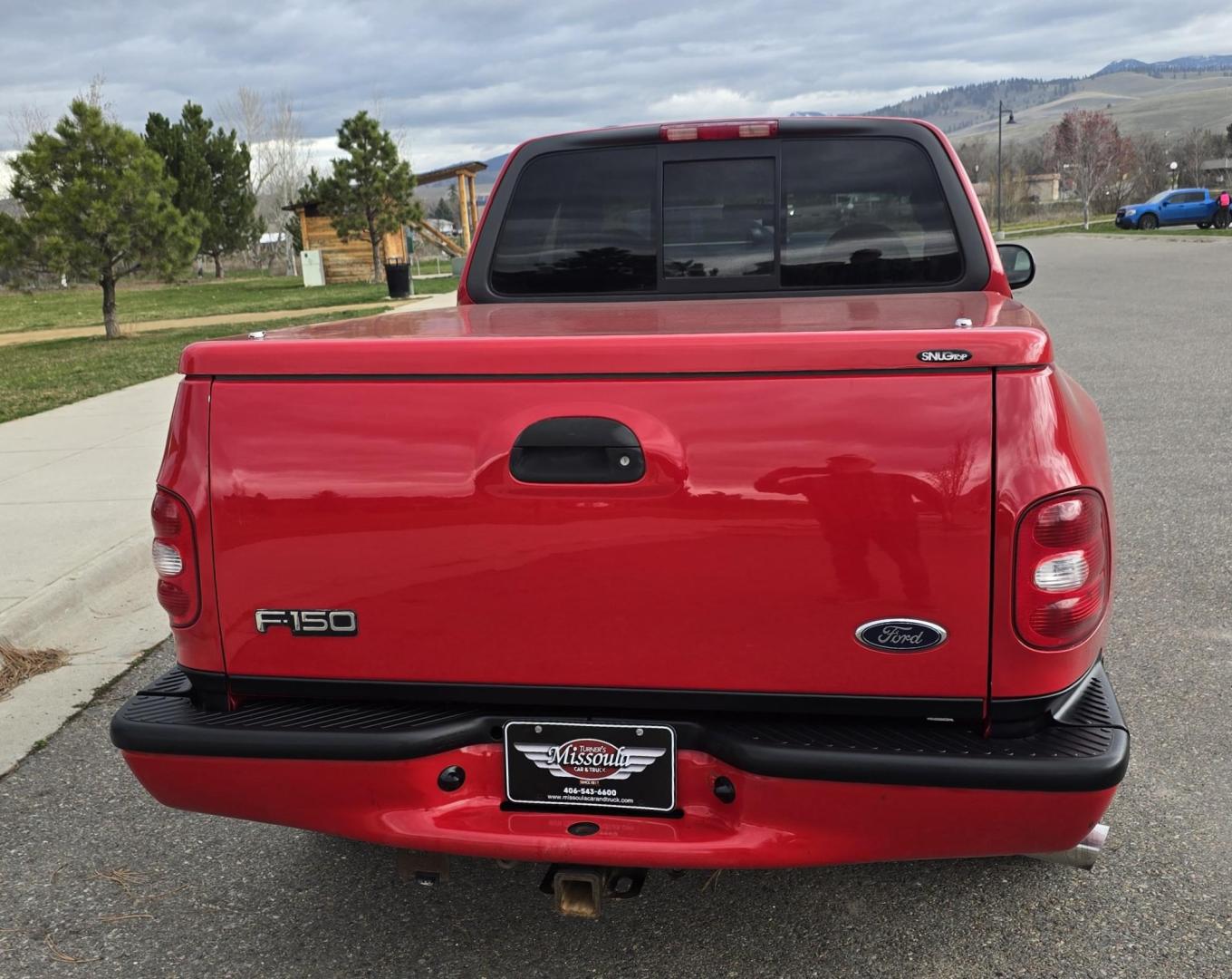2000 Red /Black Ford F-150 XL SuperCab Flareside 2WD (1FTZX0721YK) with an 4.2L V6 OHV 12V engine, Automatic transmission, located at 450 N Russell, Missoula, MT, 59801, (406) 543-6600, 46.874496, -114.017433 - Cute F150 Stepside 2WD Pickup. Extended Cab. 4.2L V6 Engine. Automatic Transmission. Air. Cruise. Tilt. Power Windows and Locks. Aftermarket Bluetooth CD PLayer. Nice Hard Top on the Box. Excellent Cooper Tires. Because of the age, financing is not available through our lenders. - Photo#6