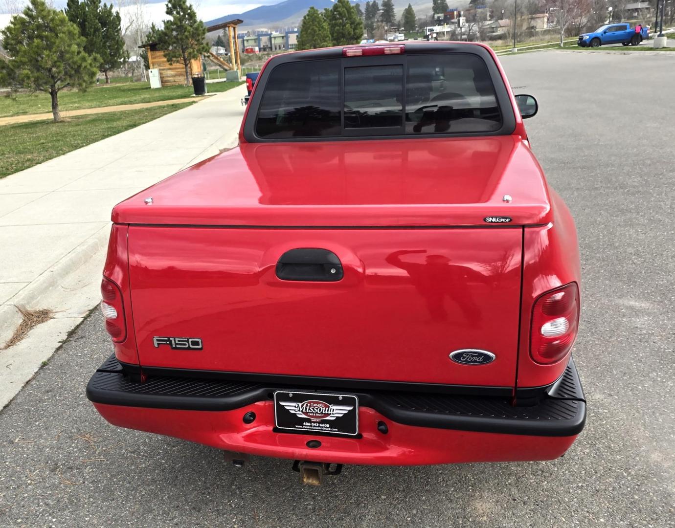 2000 Red /Black Ford F-150 XL SuperCab Flareside 2WD (1FTZX0721YK) with an 4.2L V6 OHV 12V engine, Automatic transmission, located at 450 N Russell, Missoula, MT, 59801, (406) 543-6600, 46.874496, -114.017433 - Cute F150 Stepside 2WD Pickup. Extended Cab. 4.2L V6 Engine. Automatic Transmission. Air. Cruise. Tilt. Power Windows and Locks. Aftermarket Bluetooth CD PLayer. Nice Hard Top on the Box. Excellent Cooper Tires. Because of the age, financing is not available through our lenders. - Photo#7