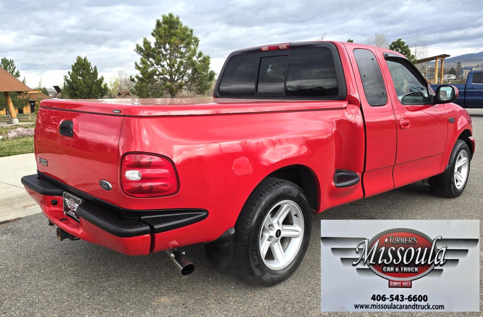 2000 Red /Black Ford F-150 XL SuperCab Flareside 2WD (1FTZX0721YK) with an 4.2L V6 OHV 12V engine, Automatic transmission, located at 450 N Russell, Missoula, MT, 59801, (406) 543-6600, 46.874496, -114.017433 - Cute F150 Stepside 2WD Pickup. Extended Cab. 4.2L V6 Engine. Automatic Transmission. Air. Cruise. Tilt. Power Windows and Locks. Aftermarket Bluetooth CD PLayer. Nice Hard Top on the Box. Excellent Cooper Tires. Because of the age, financing is not available through our lenders. - Photo#3