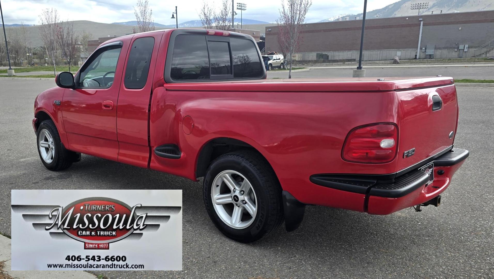 2000 Red /Black Ford F-150 XL SuperCab Flareside 2WD (1FTZX0721YK) with an 4.2L V6 OHV 12V engine, Automatic transmission, located at 450 N Russell, Missoula, MT, 59801, (406) 543-6600, 46.874496, -114.017433 - Cute F150 Stepside 2WD Pickup. Extended Cab. 4.2L V6 Engine. Automatic Transmission. Air. Cruise. Tilt. Power Windows and Locks. Aftermarket Bluetooth CD PLayer. Nice Hard Top on the Box. Excellent Cooper Tires. Because of the age, financing is not available through our lenders. - Photo#5
