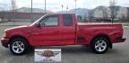 2000 Red /Black Ford F-150 XL SuperCab Flareside 2WD (1FTZX0721YK) with an 4.2L V6 OHV 12V engine, Automatic transmission, located at 450 N Russell, Missoula, MT, 59801, (406) 543-6600, 46.874496, -114.017433 - Cute F150 Stepside 2WD Pickup. Extended Cab. 4.2L V6 Engine. Automatic Transmission. Air. Cruise. Tilt. Power Windows and Locks. Aftermarket Bluetooth CD PLayer. Nice Hard Top on the Box. Excellent Cooper Tires. Because of the age, financing is not available through our lenders. - Photo#2