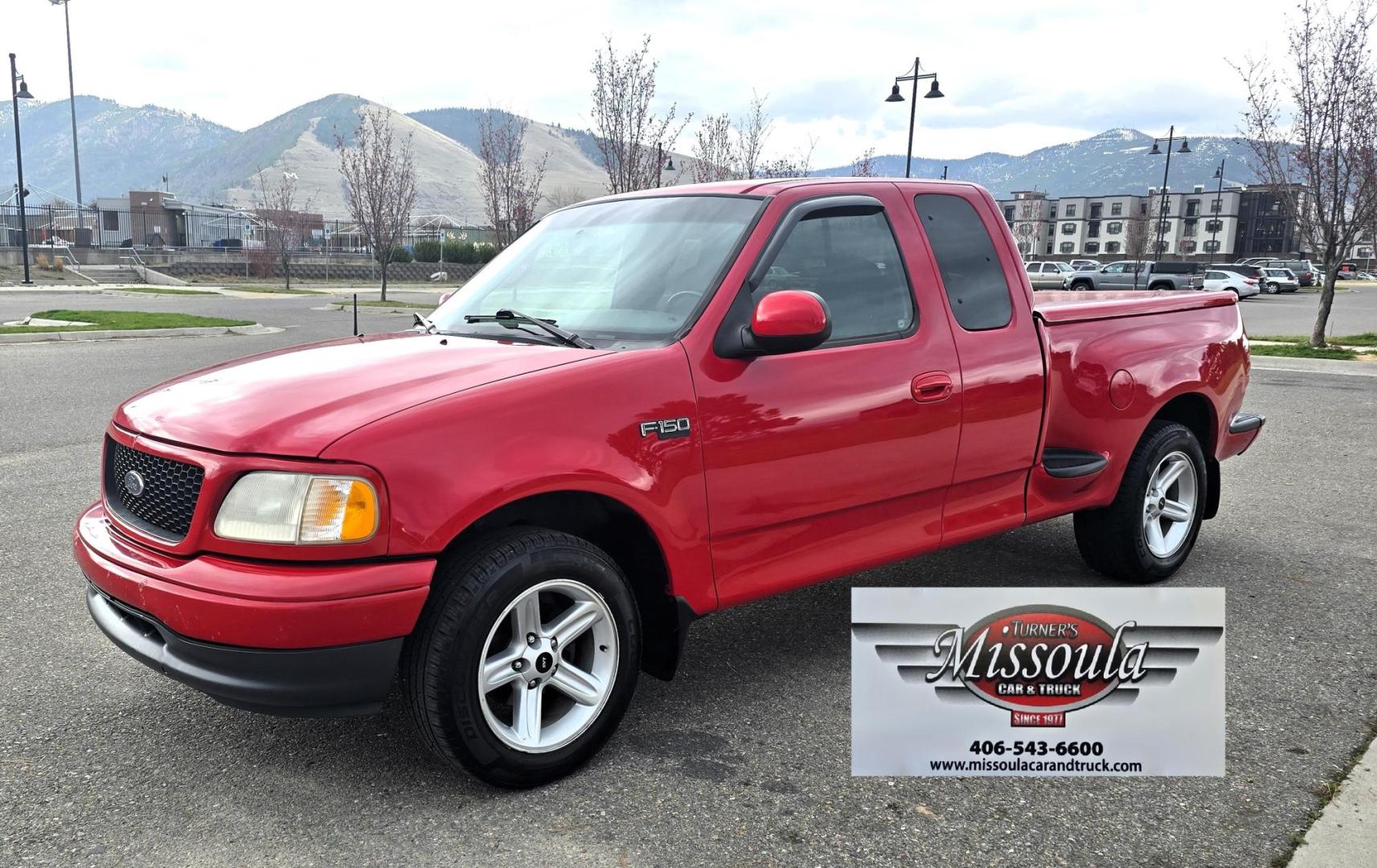 2000 Red /Black Ford F-150 XL SuperCab Flareside 2WD (1FTZX0721YK) with an 4.2L V6 OHV 12V engine, Automatic transmission, located at 450 N Russell, Missoula, MT, 59801, (406) 543-6600, 46.874496, -114.017433 - Cute F150 Stepside 2WD Pickup. Extended Cab. 4.2L V6 Engine. Automatic Transmission. Air. Cruise. Tilt. Power Windows and Locks. Aftermarket Bluetooth CD PLayer. Nice Hard Top on the Box. Excellent Cooper Tires. Because of the age, financing is not available through our lenders. - Photo#4
