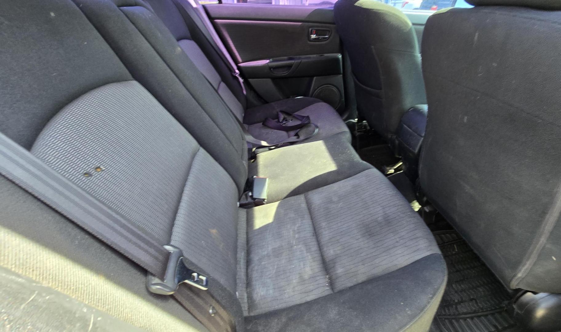 2008 Black /Black Mazda MAZDA3 i Sport 4-Door (JM1BK32FX81) with an 2.0L L4 DOHC 16V engine, Automatic transmission, located at 450 N Russell, Missoula, MT, 59801, (406) 543-6600, 46.874496, -114.017433 - Runs Great. Starts every time. 2.0L I4 Engine. Automatic Transmission. FWD. Air. Cruise. Tilt. Power Windows and Locks. AM FM XM CD Stereo with Bluetooth. Sunroof doe not open. Nice Wheels. - Photo#13