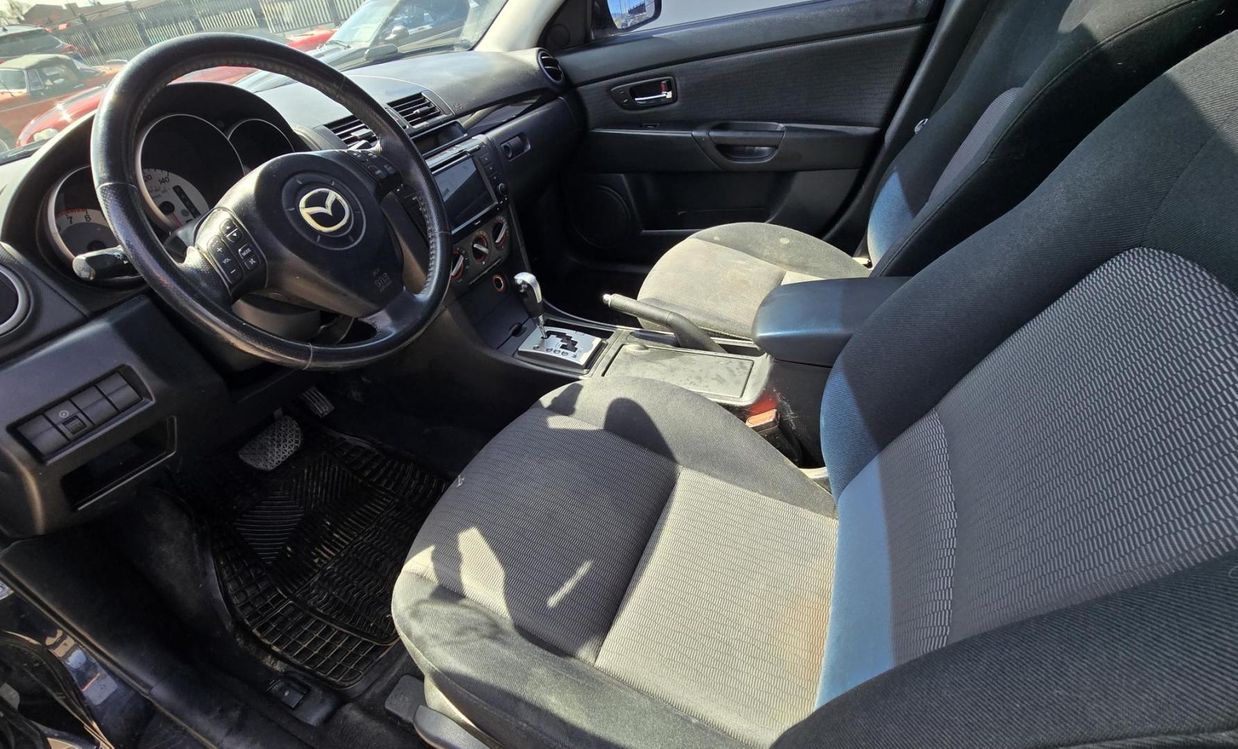 2008 Black /Black Mazda MAZDA3 i Sport 4-Door (JM1BK32FX81) with an 2.0L L4 DOHC 16V engine, Automatic transmission, located at 450 N Russell, Missoula, MT, 59801, (406) 543-6600, 46.874496, -114.017433 - Runs Great. Starts every time. 2.0L I4 Engine. Automatic Transmission. FWD. Air. Cruise. Tilt. Power Windows and Locks. AM FM XM CD Stereo with Bluetooth. Sunroof doe not open. Nice Wheels. - Photo#16