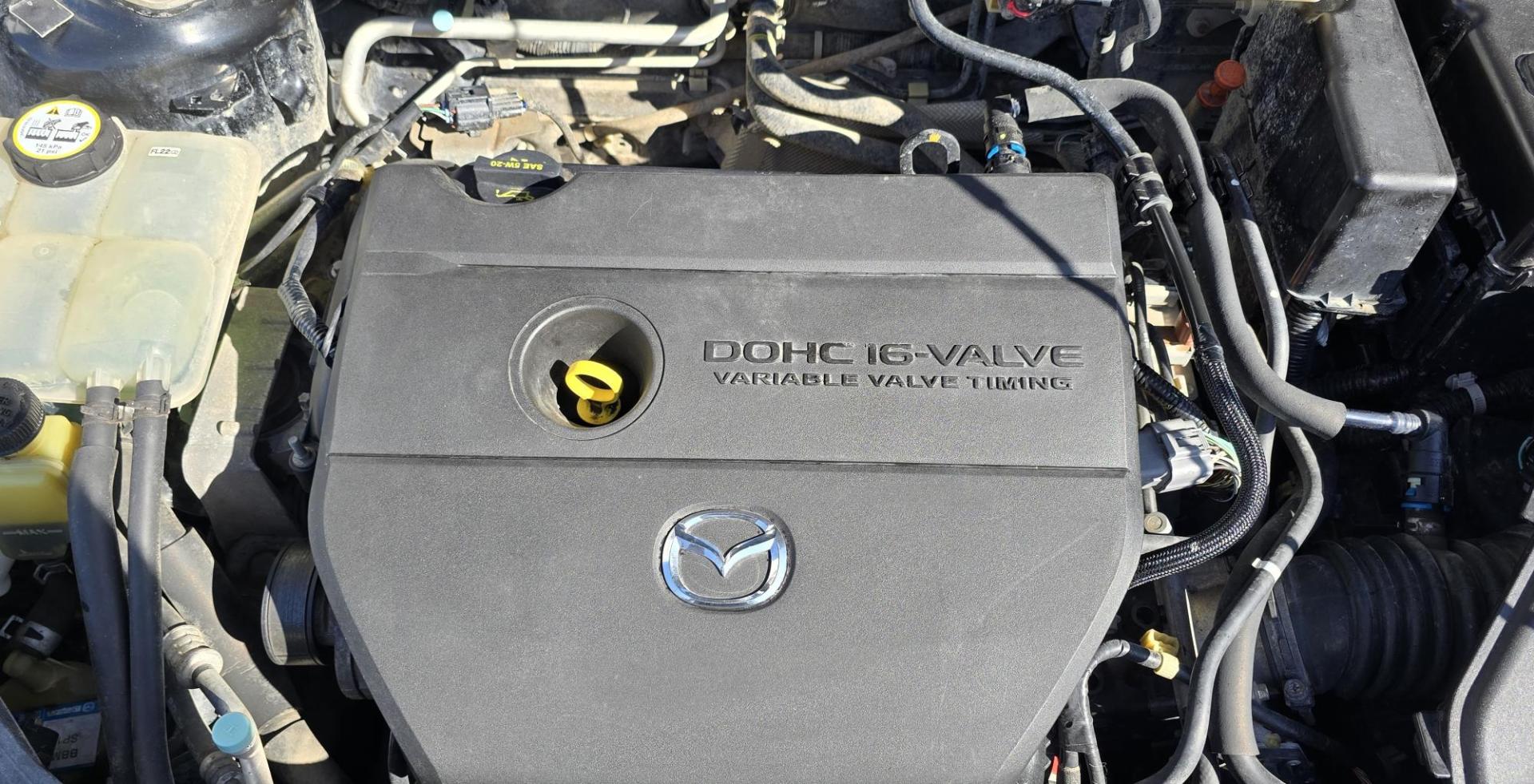 2008 Black /Black Mazda MAZDA3 i Sport 4-Door (JM1BK32FX81) with an 2.0L L4 DOHC 16V engine, Automatic transmission, located at 450 N Russell, Missoula, MT, 59801, (406) 543-6600, 46.874496, -114.017433 - Runs Great. Starts every time. 2.0L I4 Engine. Automatic Transmission. FWD. Air. Cruise. Tilt. Power Windows and Locks. AM FM XM CD Stereo with Bluetooth. Sunroof doe not open. Nice Wheels. - Photo#17