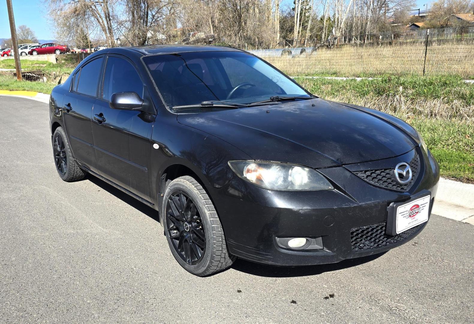 2008 Black /Black Mazda MAZDA3 i Sport 4-Door (JM1BK32FX81) with an 2.0L L4 DOHC 16V engine, Automatic transmission, located at 450 N Russell, Missoula, MT, 59801, (406) 543-6600, 46.874496, -114.017433 - Runs Great. Starts every time. 2.0L I4 Engine. Automatic Transmission. FWD. Air. Cruise. Tilt. Power Windows and Locks. AM FM XM CD Stereo with Bluetooth. Sunroof doe not open. Nice Wheels. - Photo#2