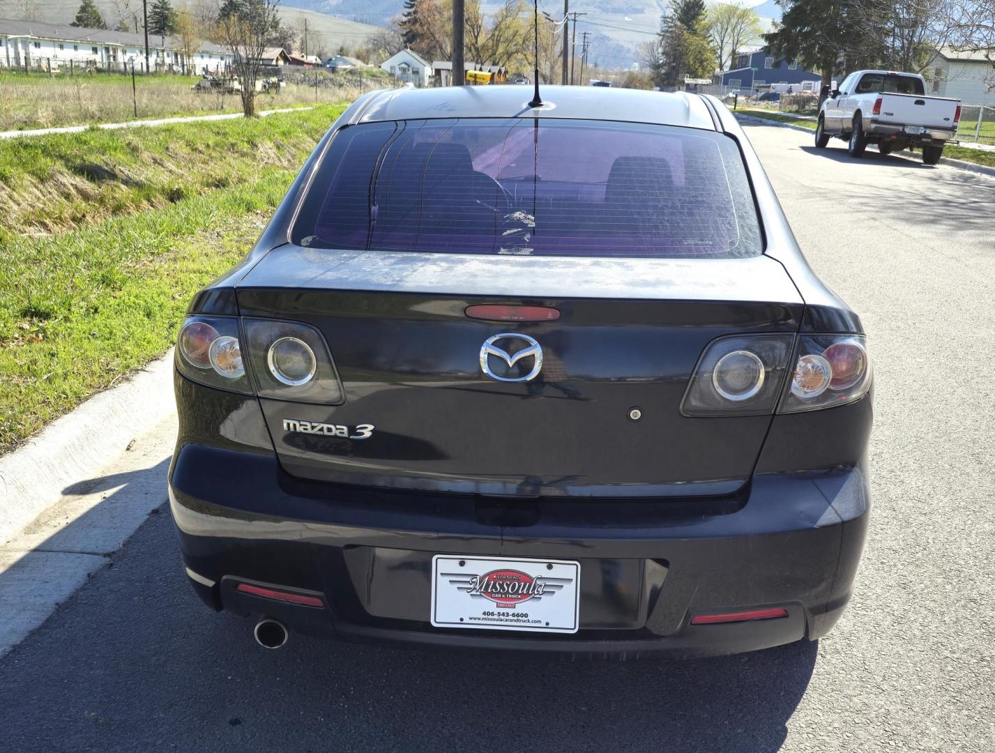 2008 Black /Black Mazda MAZDA3 i Sport 4-Door (JM1BK32FX81) with an 2.0L L4 DOHC 16V engine, Automatic transmission, located at 450 N Russell, Missoula, MT, 59801, (406) 543-6600, 46.874496, -114.017433 - Runs Great. Starts every time. 2.0L I4 Engine. Automatic Transmission. FWD. Air. Cruise. Tilt. Power Windows and Locks. AM FM XM CD Stereo with Bluetooth. Sunroof doe not open. Nice Wheels. - Photo#7