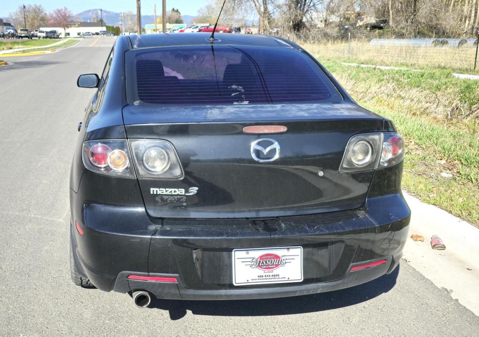 2008 Black /Black Mazda MAZDA3 i Sport 4-Door (JM1BK32FX81) with an 2.0L L4 DOHC 16V engine, Automatic transmission, located at 450 N Russell, Missoula, MT, 59801, (406) 543-6600, 46.874496, -114.017433 - Runs Great. Starts every time. 2.0L I4 Engine. Automatic Transmission. FWD. Air. Cruise. Tilt. Power Windows and Locks. AM FM XM CD Stereo with Bluetooth. Sunroof doe not open. Nice Wheels. - Photo#8