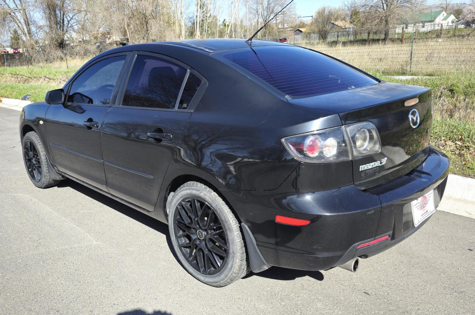 2008 Black /Black Mazda MAZDA3 i Sport 4-Door (JM1BK32FX81) with an 2.0L L4 DOHC 16V engine, Automatic transmission, located at 450 N Russell, Missoula, MT, 59801, (406) 543-6600, 46.874496, -114.017433 - Runs Great. Starts every time. 2.0L I4 Engine. Automatic Transmission. FWD. Air. Cruise. Tilt. Power Windows and Locks. AM FM XM CD Stereo with Bluetooth. Sunroof doe not open. Nice Wheels. - Photo#6