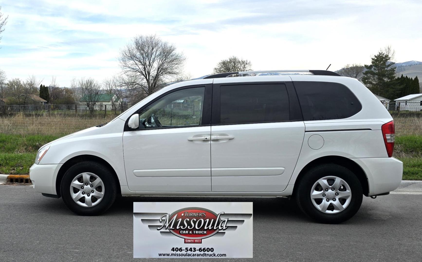 2010 White /Tan Kia Sedona Base SWB (KNDMG4C34A6) with an 3.8L V6 DOHC 24V engine, 5-Speed Automatic transmission, located at 450 N Russell, Missoula, MT, 59801, (406) 543-6600, 46.874496, -114.017433 - Clean 2 Owner FWD. 3.8L V6 Engine. Automatic Transmission. Rear Doors are Sliding for easy entrance. Front and Rear Climate Control. Air. Cruise. Tilt. Capable of third row seating but the rear seat is not there. AM FM CD Player. Clean Title and Carfax. - Photo#0
