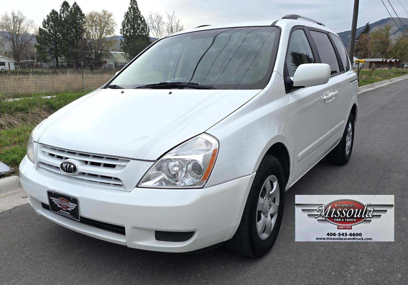 2010 White /Tan Kia Sedona Base SWB (KNDMG4C34A6) with an 3.8L V6 DOHC 24V engine, 5-Speed Automatic transmission, located at 450 N Russell, Missoula, MT, 59801, (406) 543-6600, 46.874496, -114.017433 - Clean 2 Owner FWD. 3.8L V6 Engine. Automatic Transmission. Rear Doors are Sliding for easy entrance. Front and Rear Climate Control. Air. Cruise. Tilt. Capable of third row seating but the rear seat is not there. AM FM CD Player. Clean Title and Carfax. - Photo#1